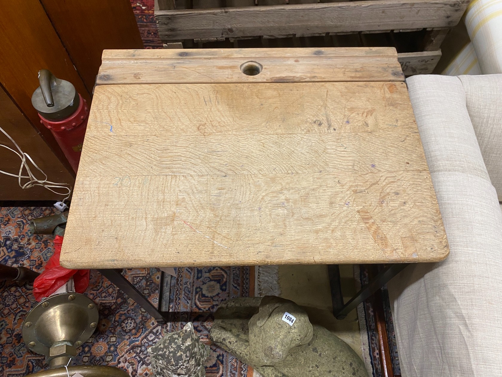 A vintage oak student's desk, width 60cm, depth 46cm, height 76cm